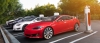 Samochody Tesla Model S i X na stacji szybkiego ładowania Tesla Supercharger